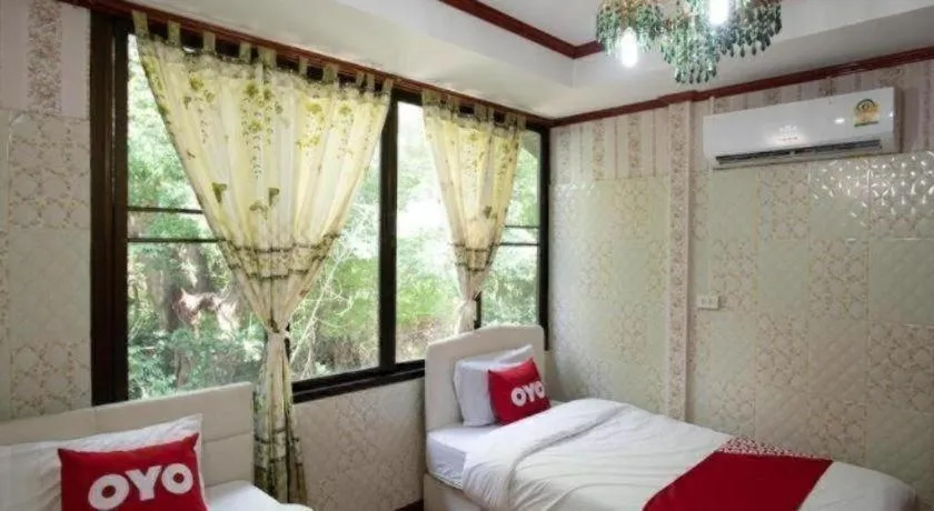 Bed in Raknatee Resort