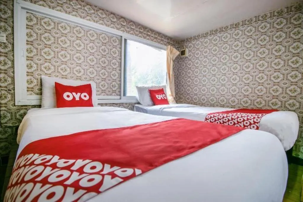 Bed in Raknatee Resort