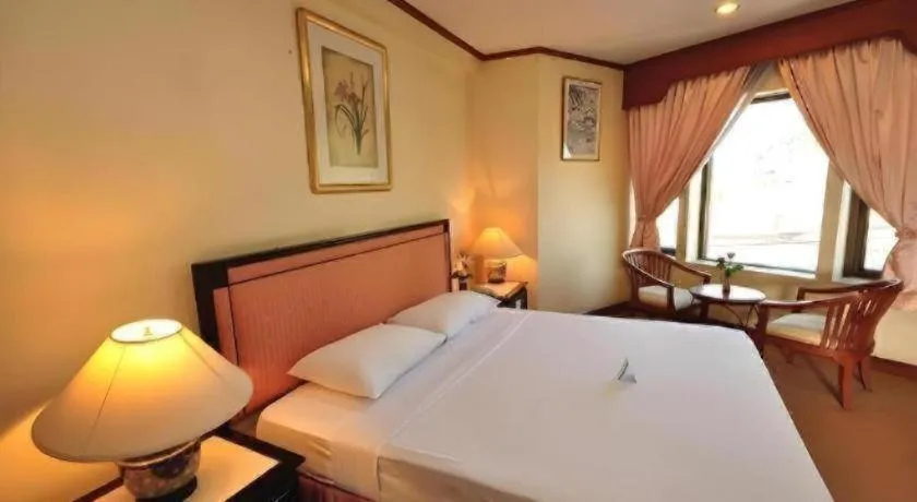 Bed in Royal Diamond Hotel