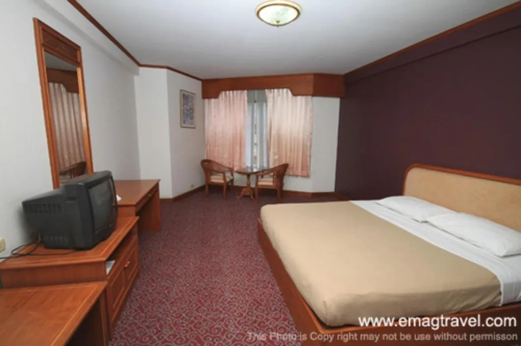 Bed in Royal Diamond Hotel