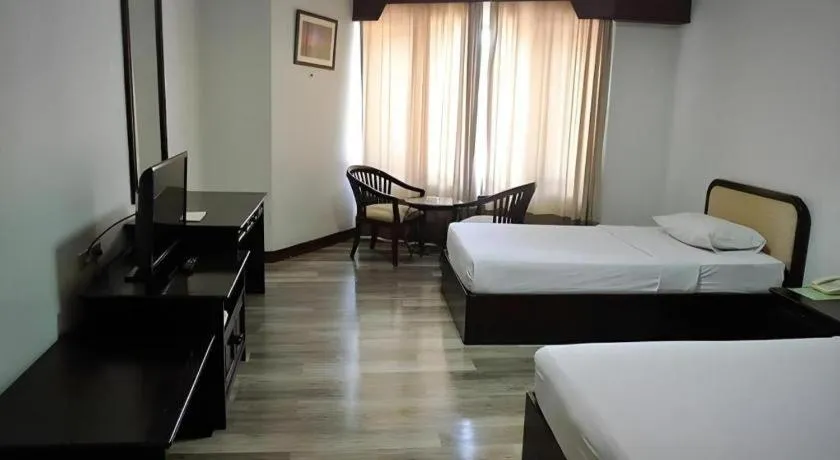 Bed in Royal Diamond Hotel