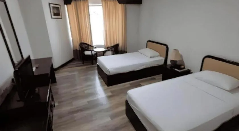 Bed in Royal Diamond Hotel