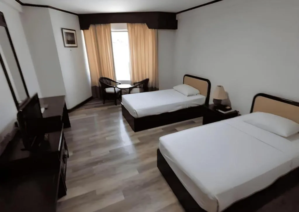 Bed in Royal Diamond Hotel