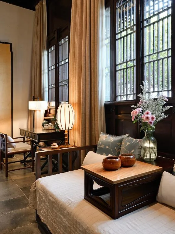 Bed in Blossom Hill Inn Suzhou Tanhuafu