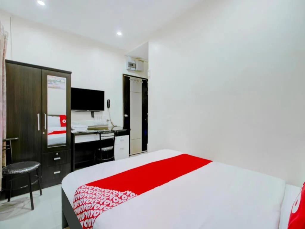 Bed in OYO 253 KK 11 Boutique Inn