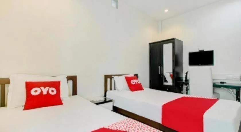 Bed in OYO 253 KK 11 Boutique Inn