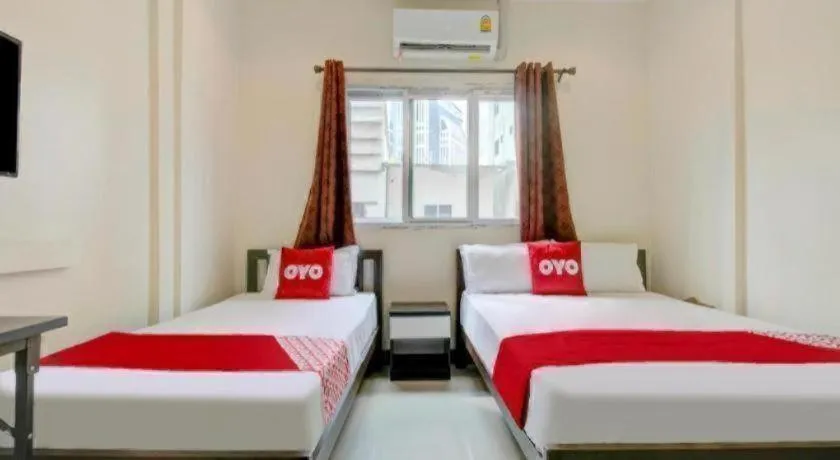 Bed in OYO 253 KK 11 Boutique Inn