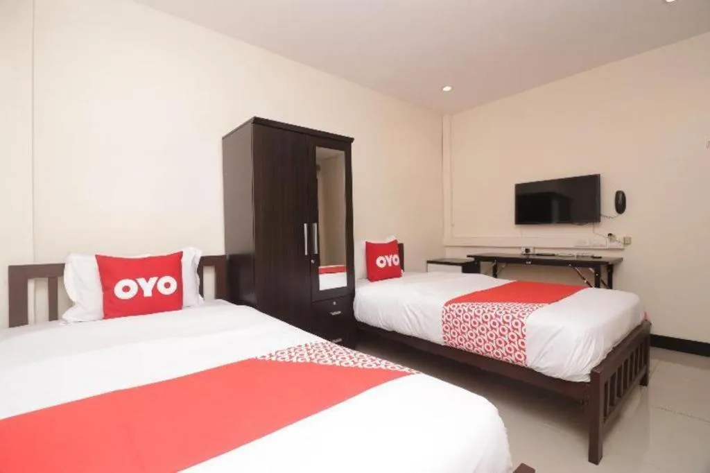 Bed in OYO 253 KK 11 Boutique Inn