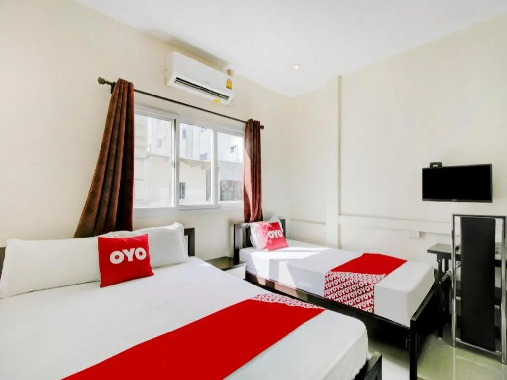 Bed in OYO 253 KK 11 Boutique Inn