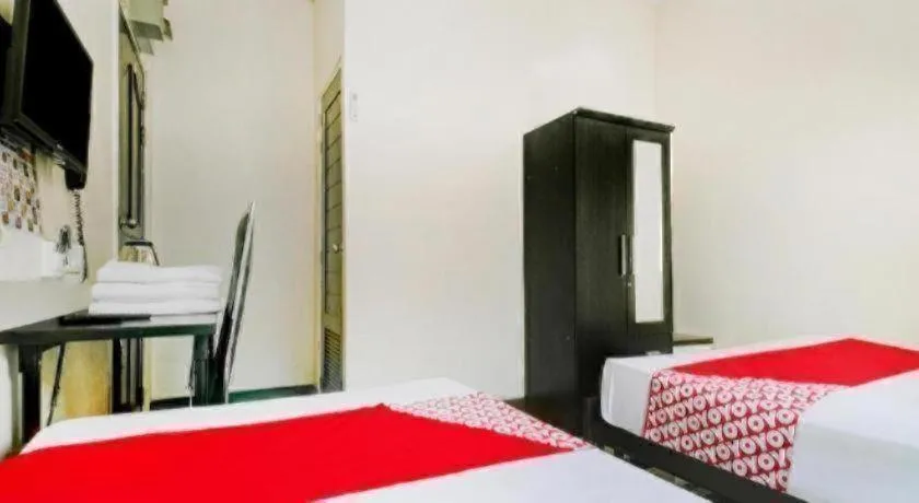 Bed in OYO 253 KK 11 Boutique Inn