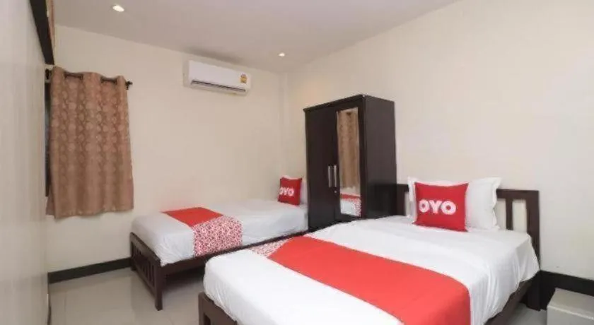 Bed in OYO 253 KK 11 Boutique Inn
