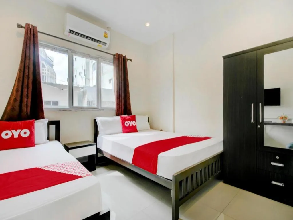 Bed in OYO 253 KK 11 Boutique Inn