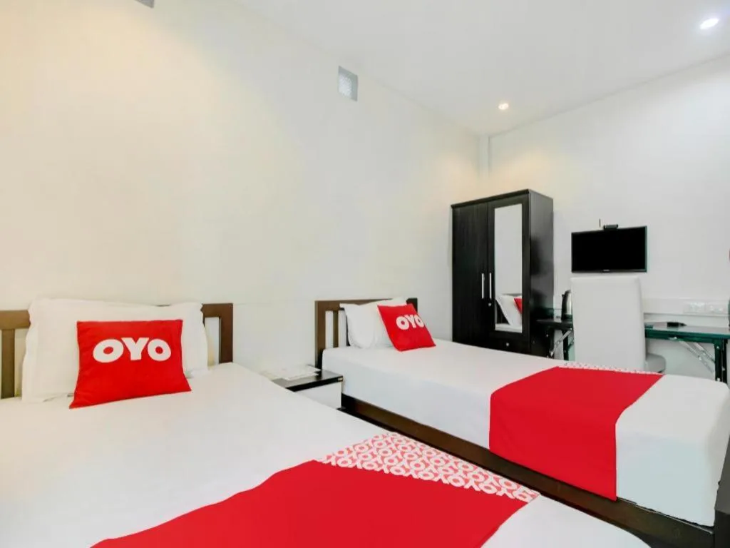 Bed in OYO 253 KK 11 Boutique Inn