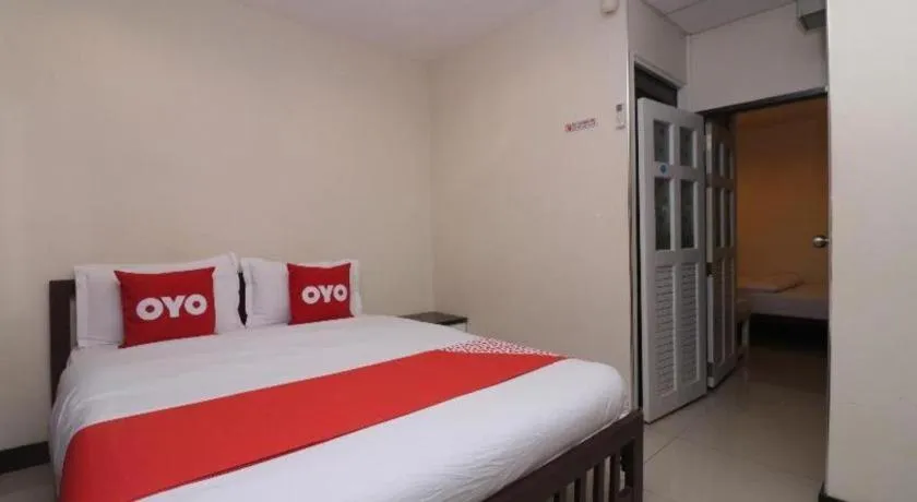 Bed in OYO 253 KK 11 Boutique Inn