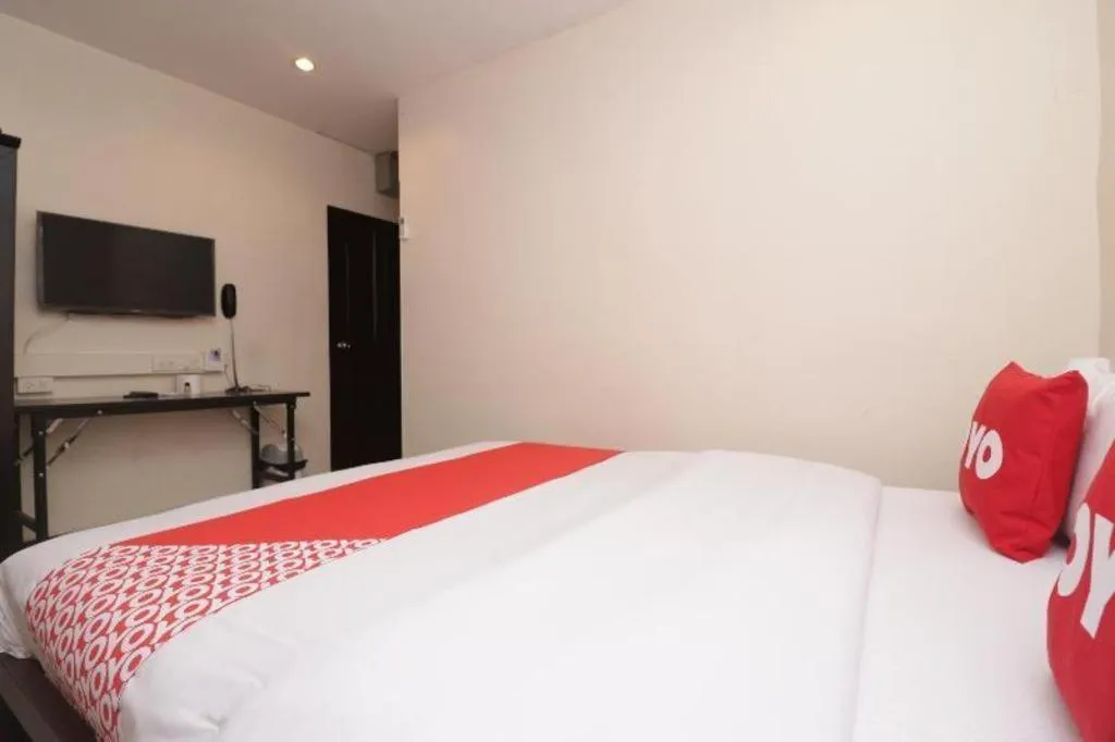 Bed in OYO 253 KK 11 Boutique Inn