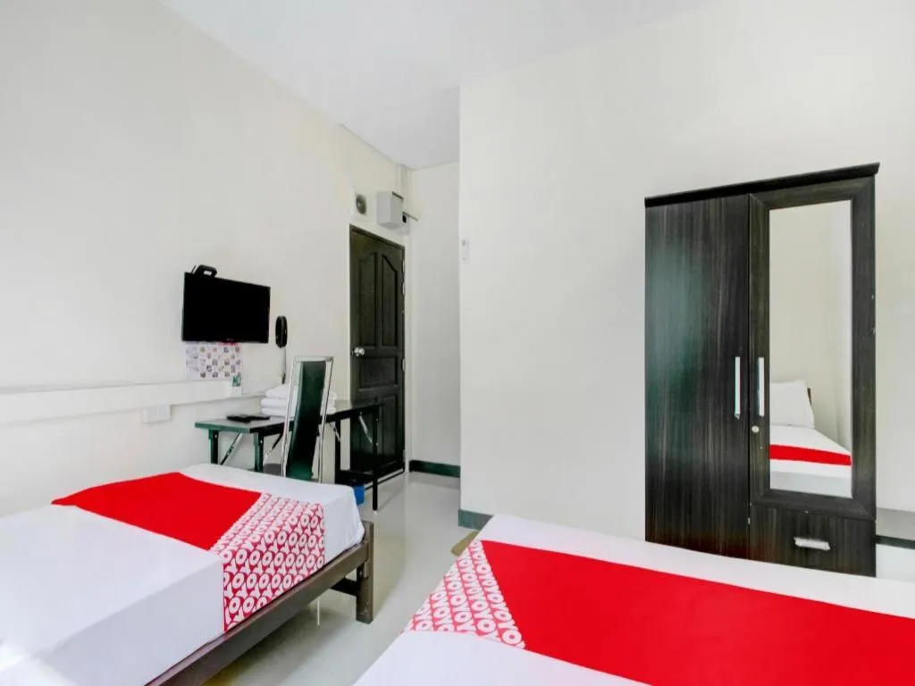 Bed in OYO 253 KK 11 Boutique Inn