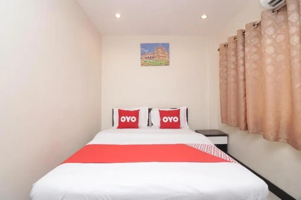 Bed in OYO 253 KK 11 Boutique Inn