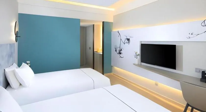 Bed in Magnotel Hotel·Shanghai Xintiandi