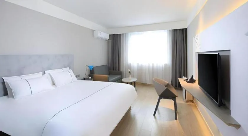 Bed in Magnotel Hotel·Shanghai Xintiandi