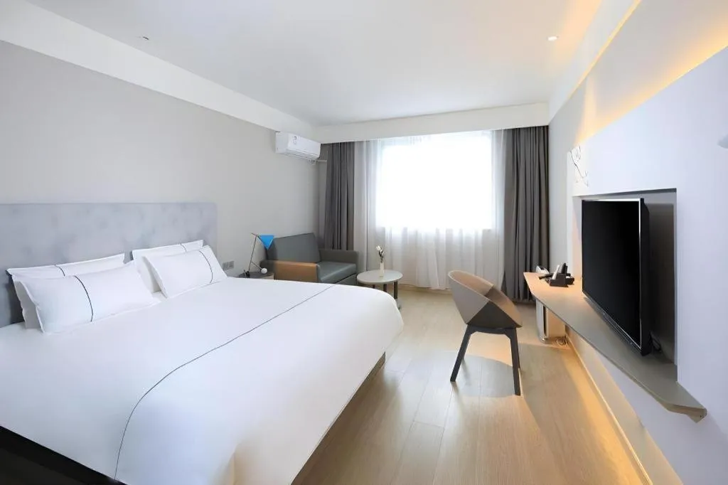 Bed in Magnotel Hotel·Shanghai Xintiandi