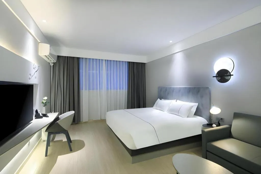 Bed in Magnotel Hotel·Shanghai Xintiandi