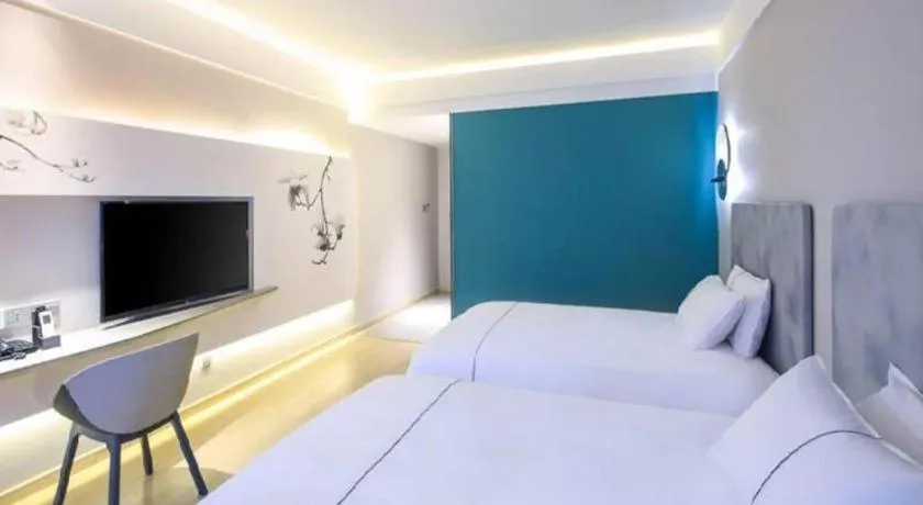 Bed in Magnotel Hotel·Shanghai Xintiandi