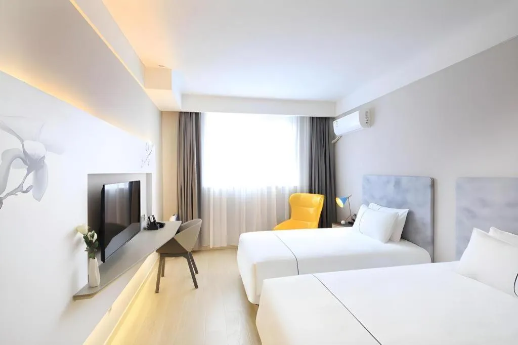 Bed in Magnotel Hotel·Shanghai Xintiandi