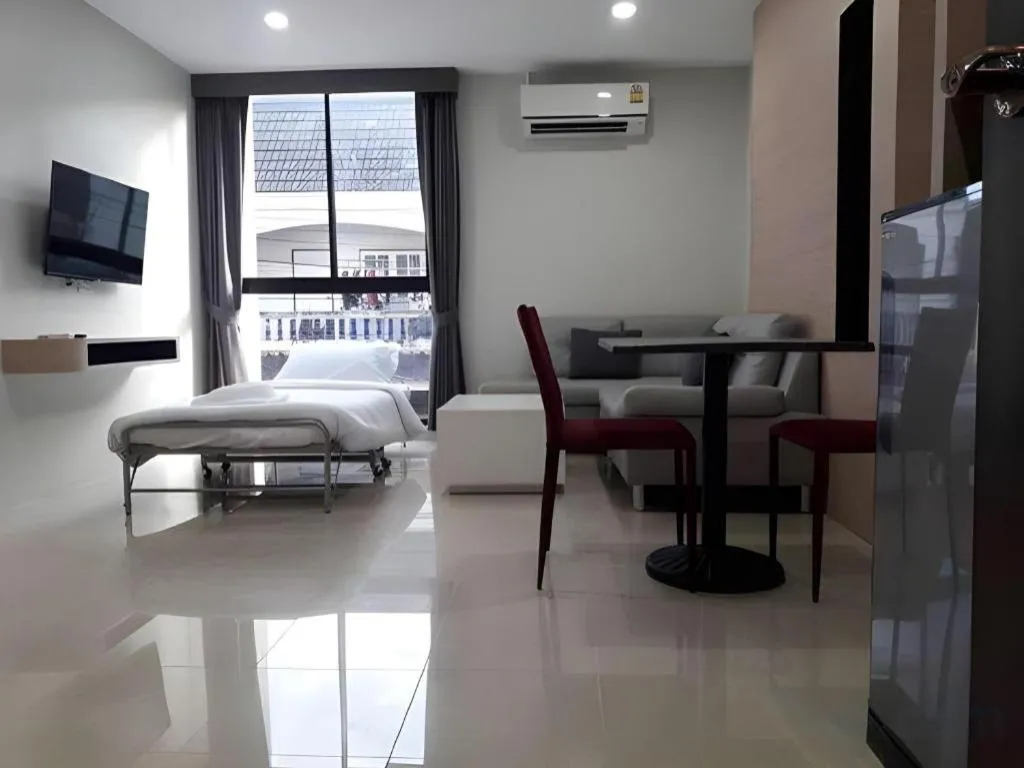 Bed in Sattahip 9 Boutique Hotel