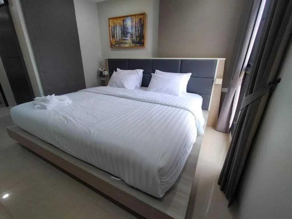 Bed in Sattahip 9 Boutique Hotel