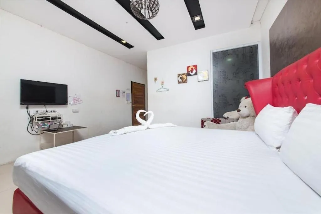 Bed in Oasis Hiso Hotel