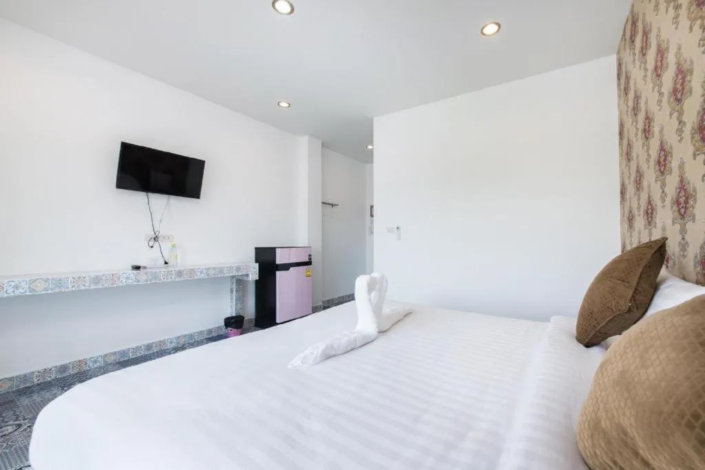 Bed in Oasis Hiso Hotel