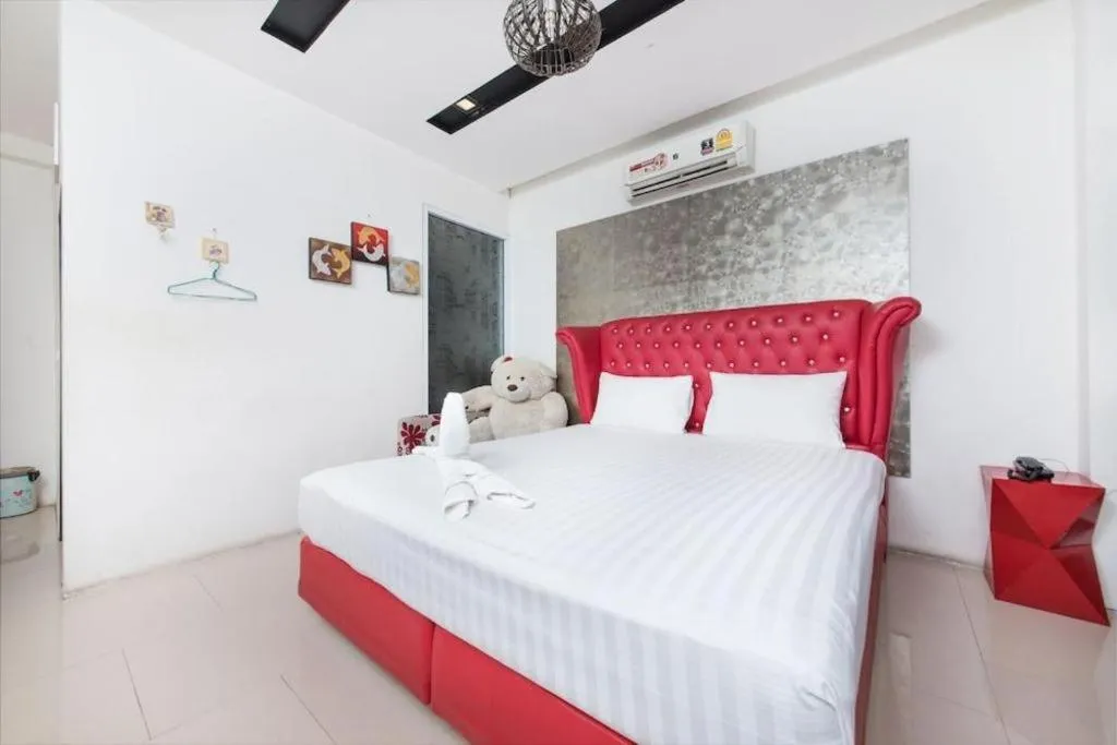 Bed in Oasis Hiso Hotel