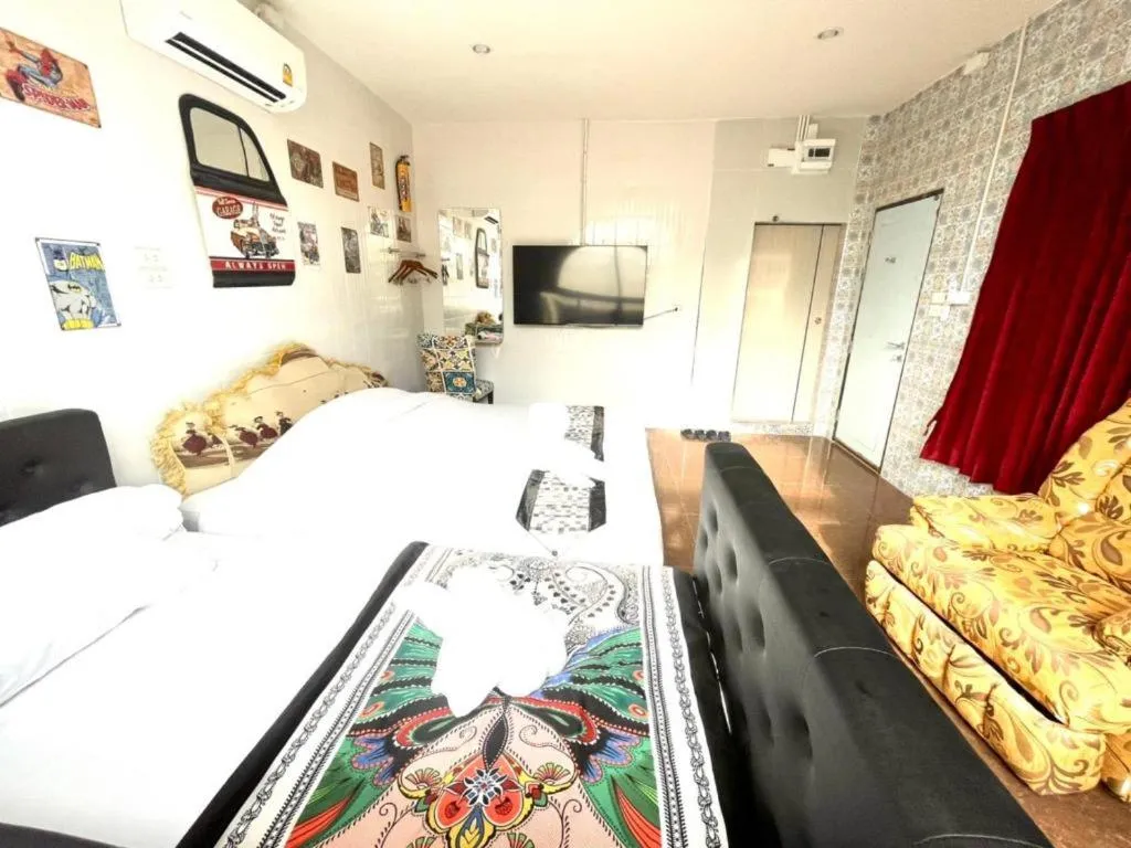 Bed in Oasis Hiso Hotel