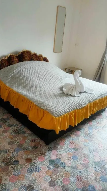 Bed in Oasis Hiso Hotel