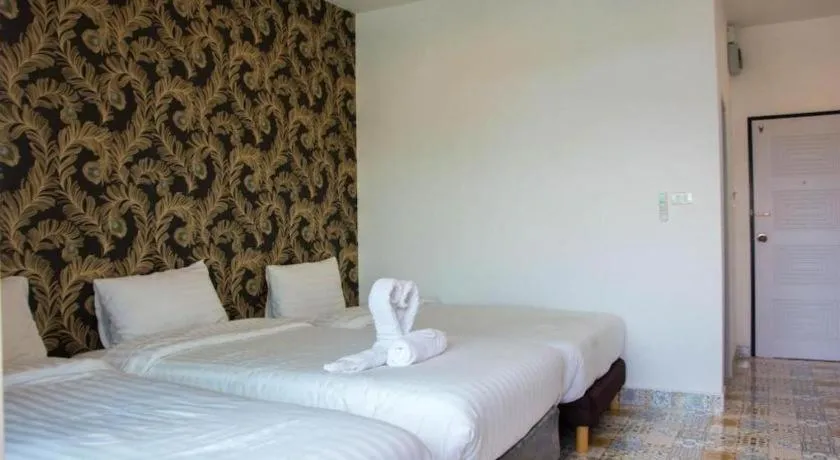 Bed in Oasis Hiso Hotel