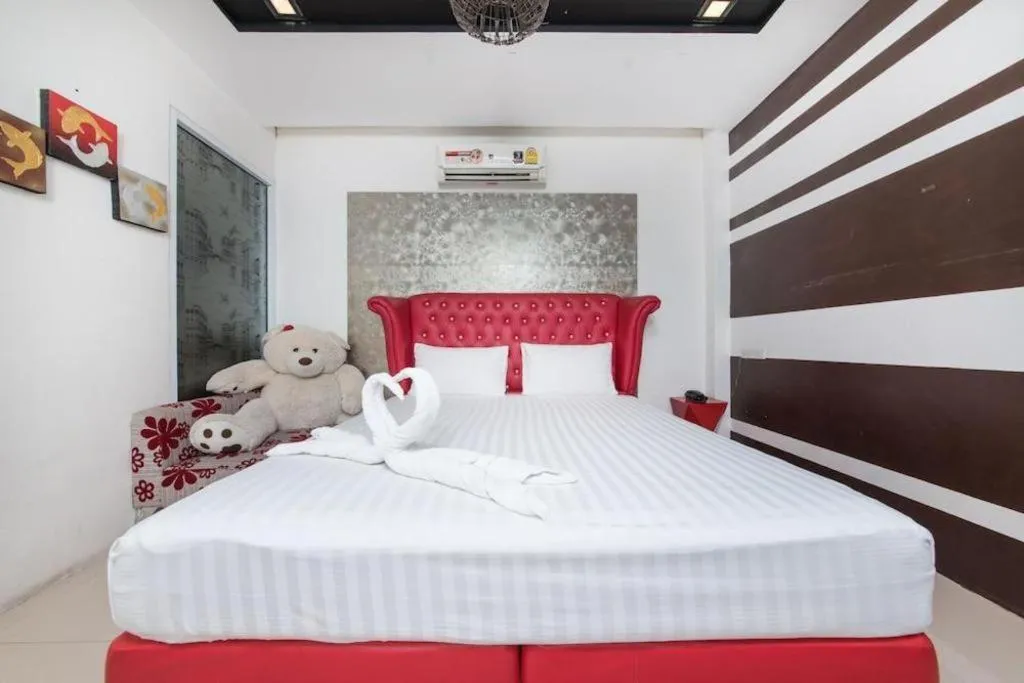 Bed in Oasis Hiso Hotel