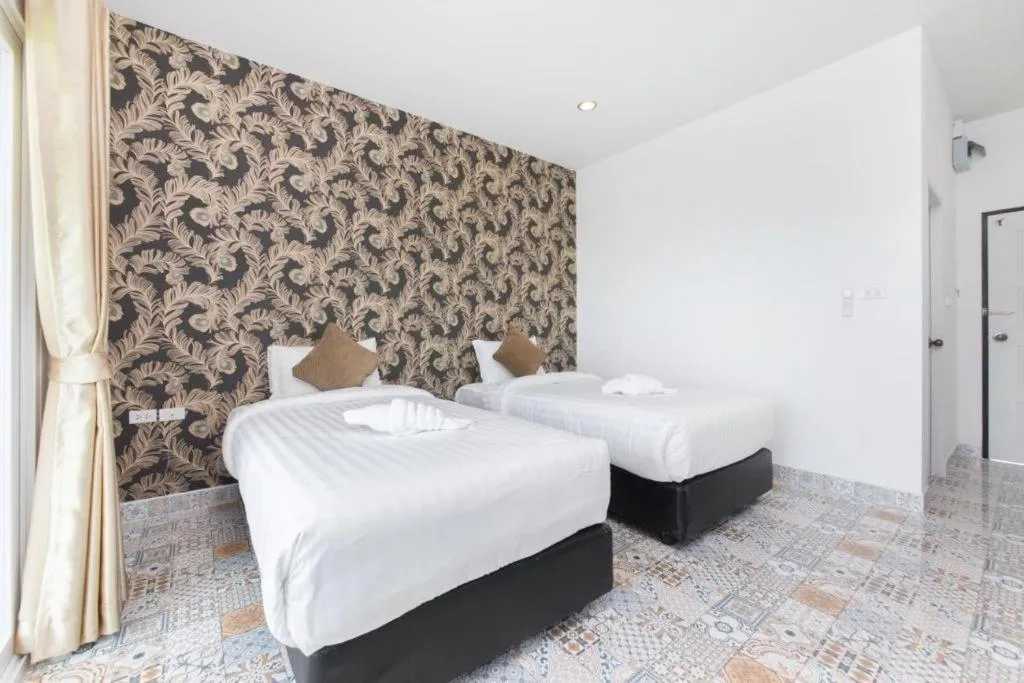 Bed in Oasis Hiso Hotel