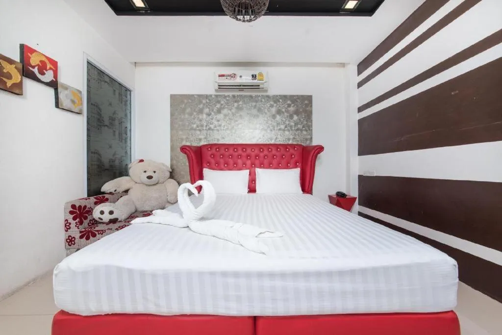 Bed in Oasis Hiso Hotel