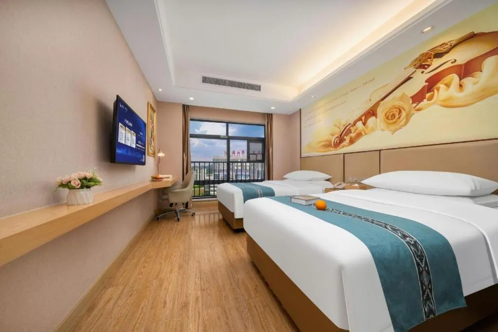 Bed in Vienna Hotel Nanning Xiangsi Lake University Town