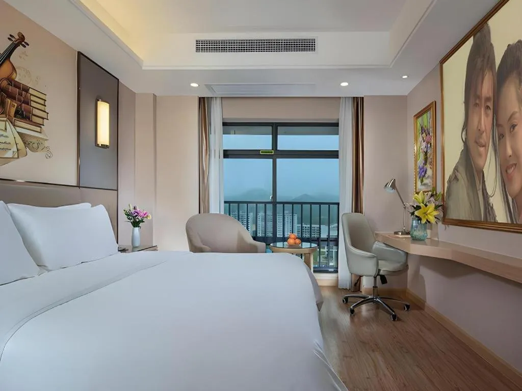 Bed in Vienna Hotel Nanning Xiangsi Lake University Town