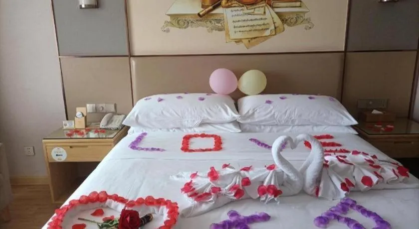 Bed in Vienna Hotel Nanning Xiangsi Lake University Town