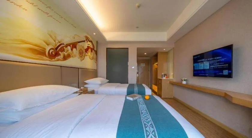 Bed in Vienna Hotel Nanning Xiangsi Lake University Town