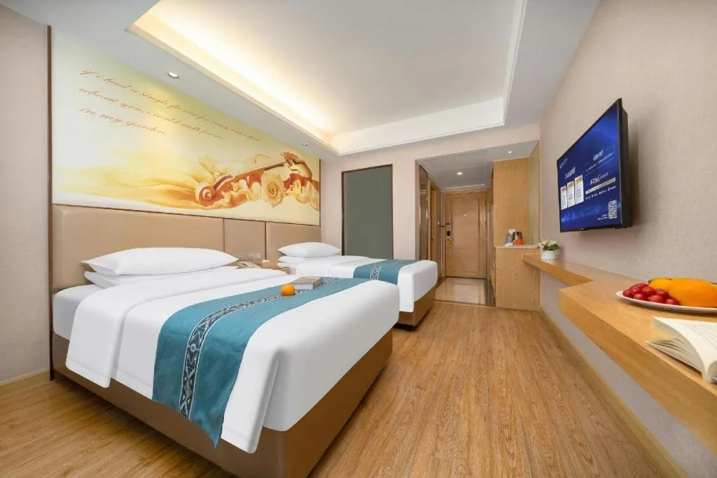 Bed in Vienna Hotel Nanning Xiangsi Lake University Town