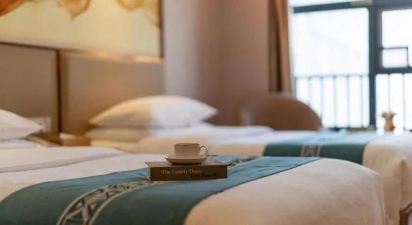 Bed in Vienna Hotel Nanning Xiangsi Lake University Town