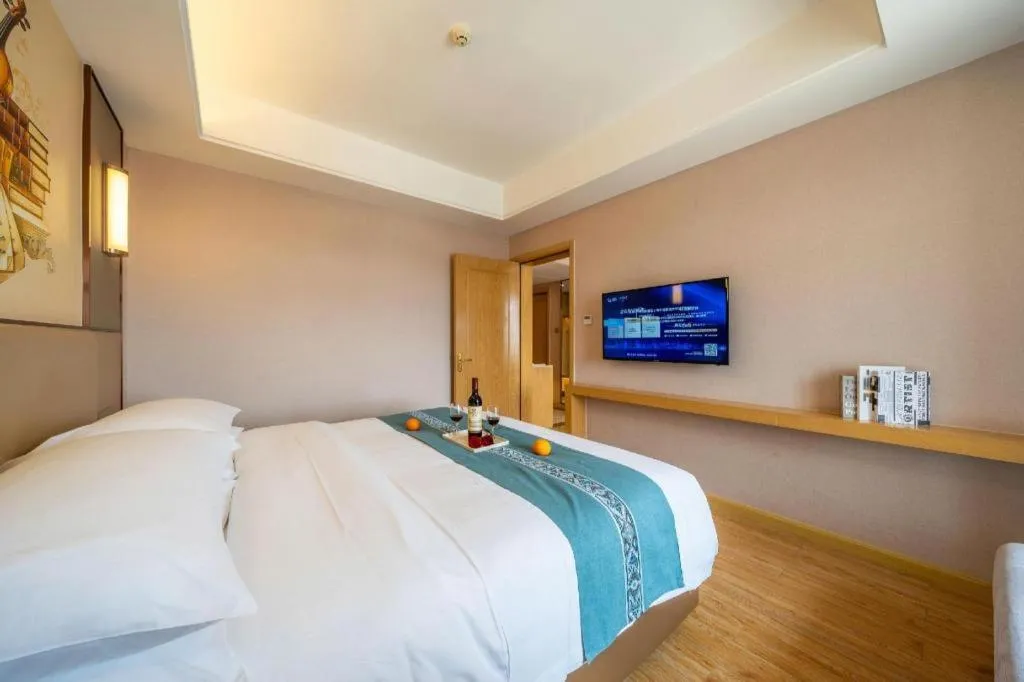 Bed in Vienna Hotel Nanning Xiangsi Lake University Town