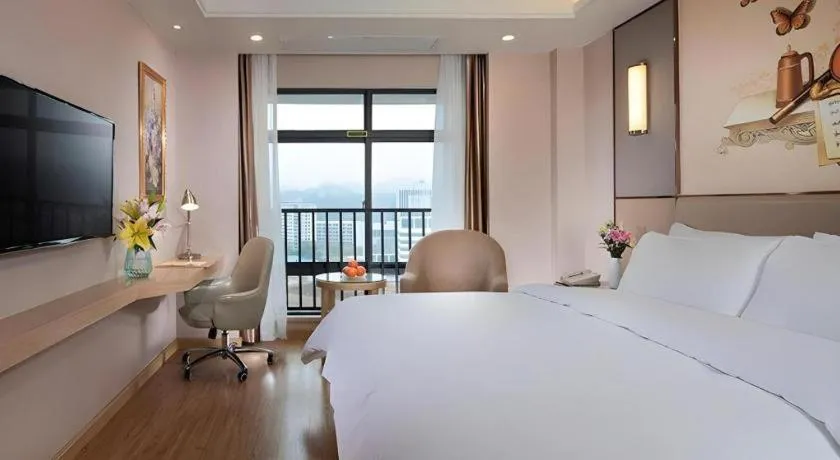 Bed in Vienna Hotel Nanning Xiangsi Lake University Town