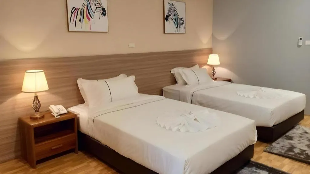 Bed in One Vientiane Hotel