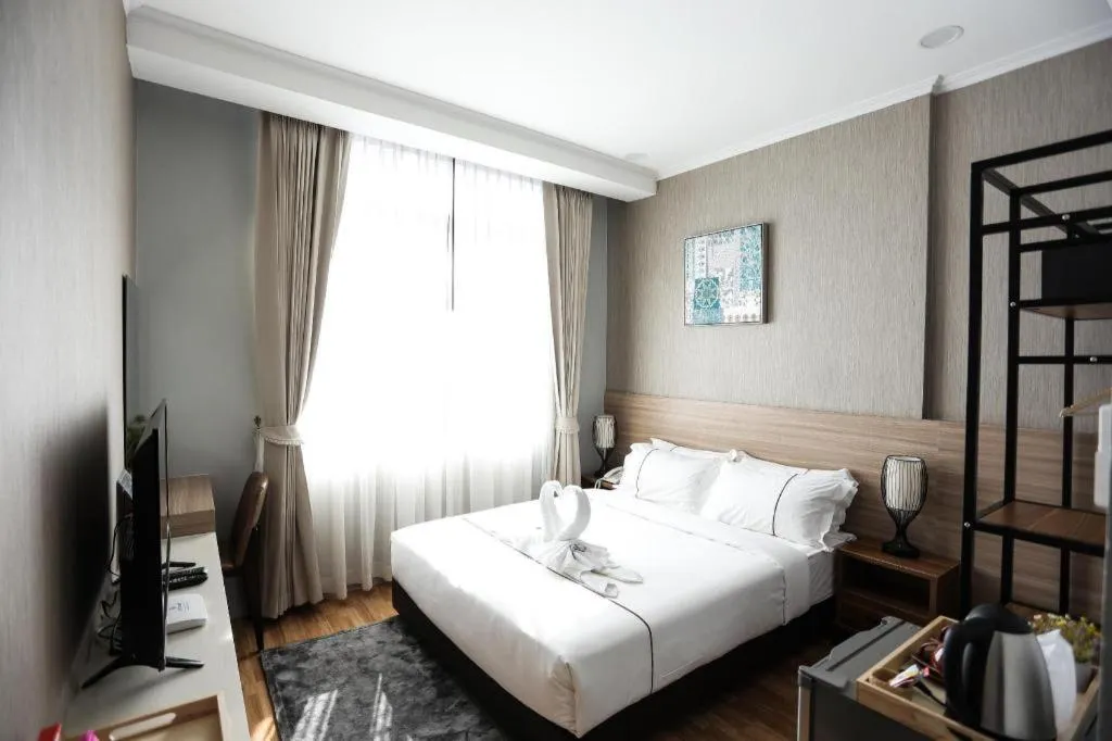 Bed in One Vientiane Hotel