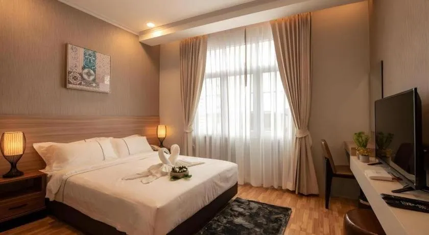 Bed in One Vientiane Hotel