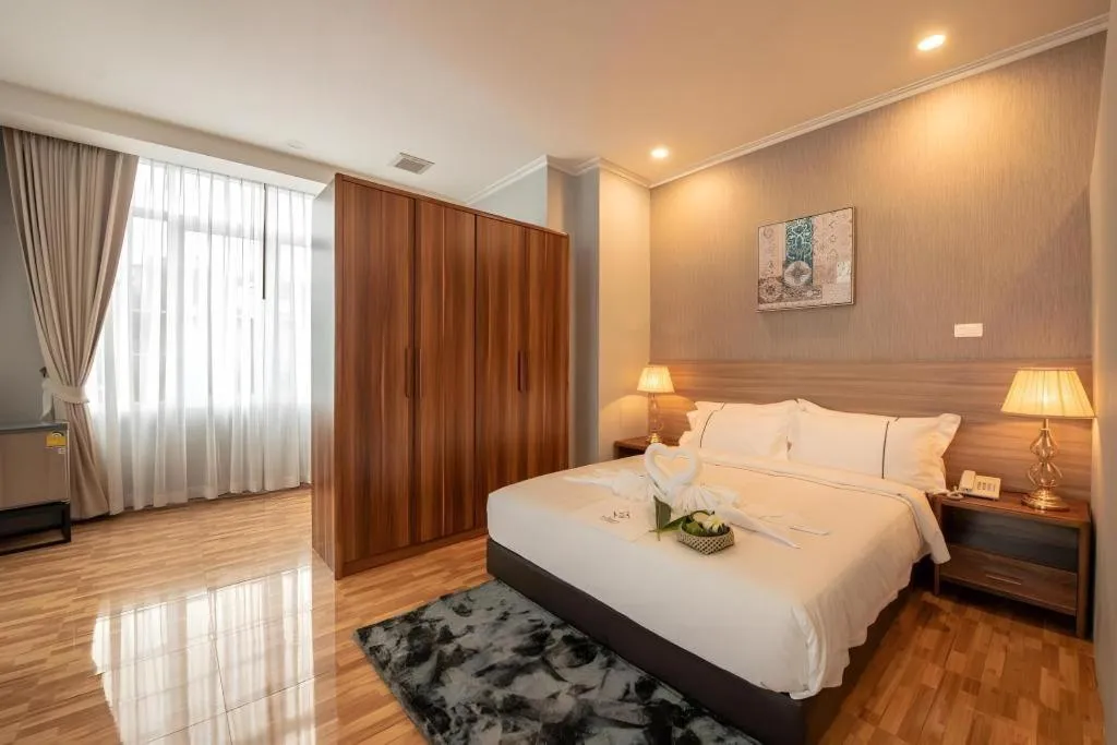 Bed in One Vientiane Hotel